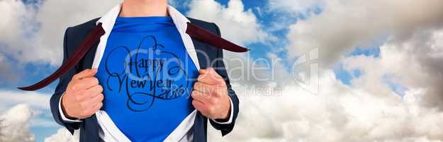 Composite image of businessman opening his shirt superhero style