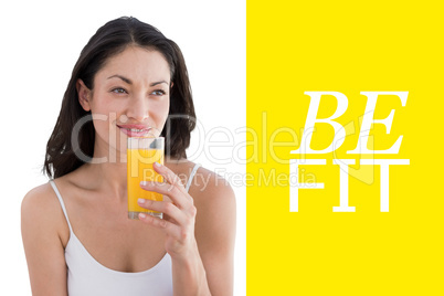 Composite image of woman drinking orange juice