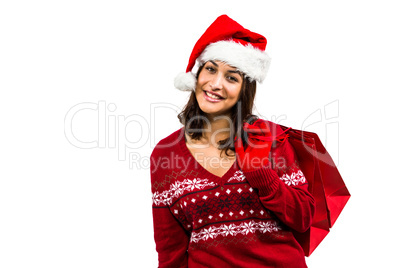 Festive brunette with gift bag