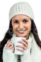 Smiling woman holding white cup