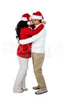 Festive senior couple hugging