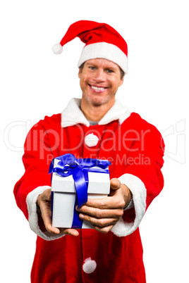 Happy man in santa costume with gift