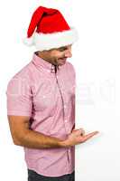 Festive man showing a sign