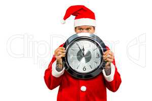 Happy man in santa costume showing clock