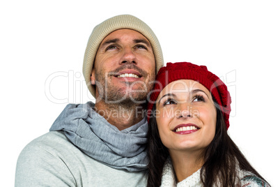 Smiling couple looking up