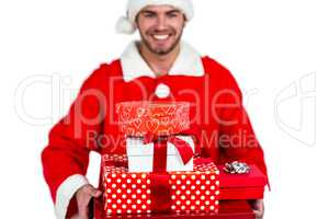 Happy man in santa costume with gifts