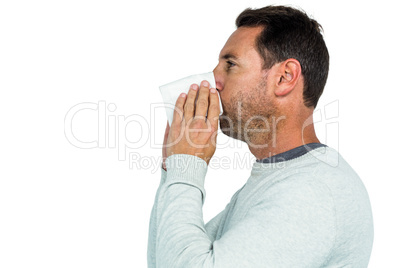 Man blowing his nose