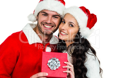 Festive couple smiling at camera