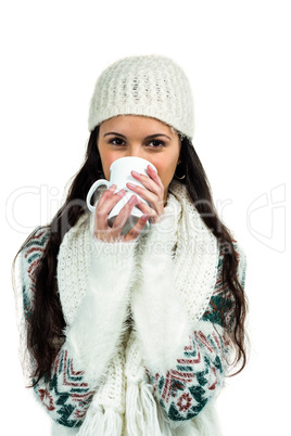 Attractive woman drinking by white cup