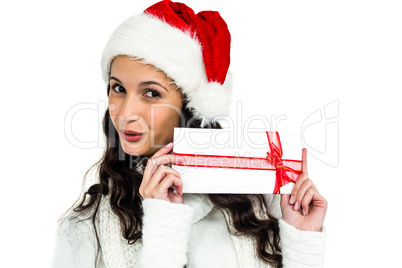 Attractive woman holding gift box