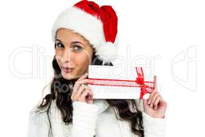 Attractive woman holding gift box