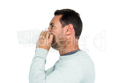 Man blowing his nose