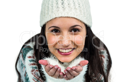 Attractive woman blowing kiss to the camera