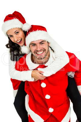 Festive couple smiling at camera