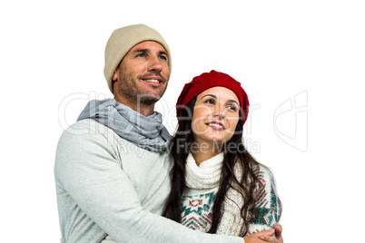 Smiling couple looking up