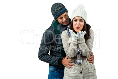 Festive couple in winter clothes