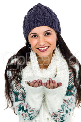 Attractive woman blowing kiss to the camera