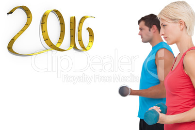 Composite image of fit man and woman lifting dumbbells