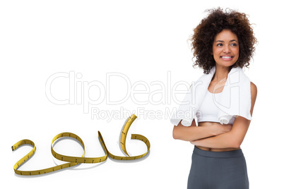 Composite image of smiling fit young woman with towel