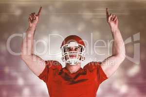 Composite image of american football player cheering