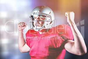 Composite image of happy sportsman cheering with clenched fist