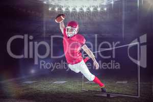 Composite image of american football player scoring a touchdown