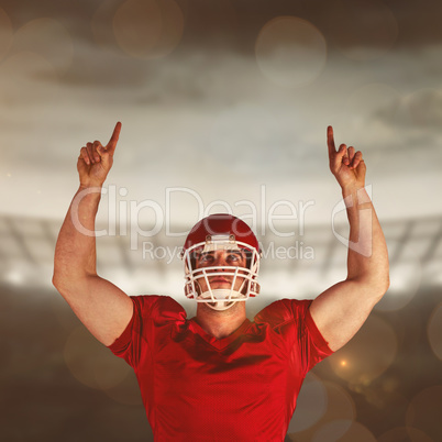 Composite image of american football player cheering