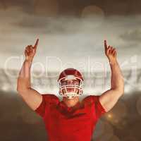 Composite image of american football player cheering