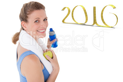 Composite image of fit woman smiling at camera