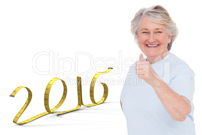 Composite image of senior woman showing thumbs up