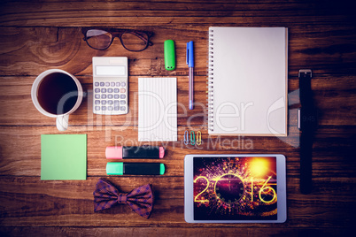 Composite image of overhead of students desk