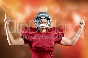 Composite image of american football player cheering