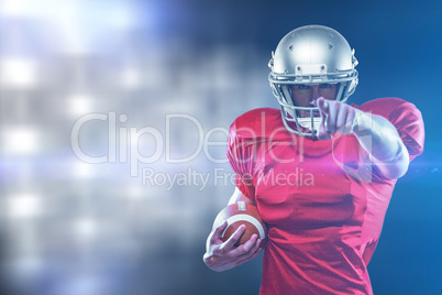 Composite image of portrait sports player in red jersey pointing