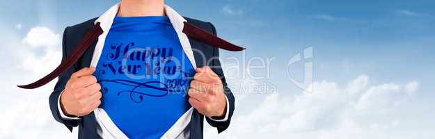 Composite image of businessman opening his shirt superhero style