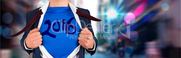 Composite image of businessman opening his shirt superhero style