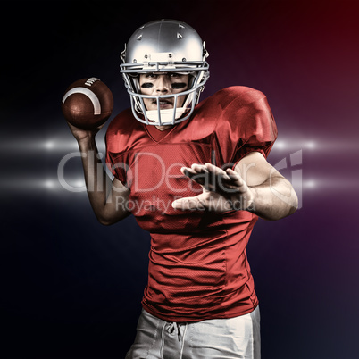 Composite image of sportsman throwing american football while playing