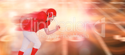 Composite image of american football player running with the bal