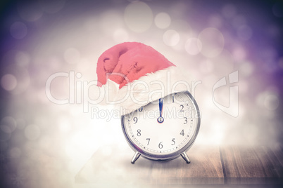 Composite image of christmas clock