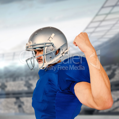 Composite image of american football player looking away while flexing muscles