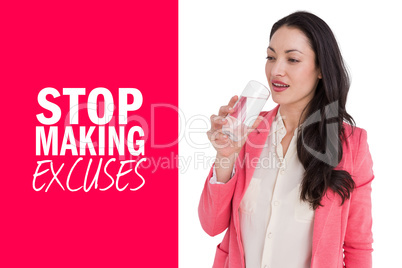 Composite image of pretty brunette drinking water