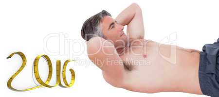 Composite image of fit man doing sit ups with no shirt on