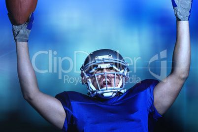 Composite image of american football player in uniform cheering