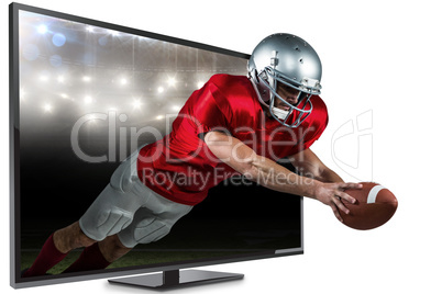 Composite image of american football player scoring a touchdown