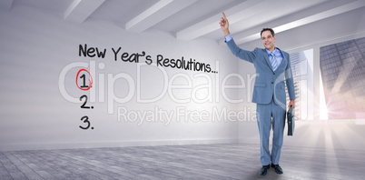 Composite image of  cheerful businessman raising his hand