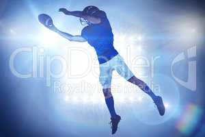 Composite image of sports player catching ball
