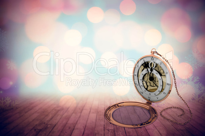 Composite image of retro styled pocket clock with chain