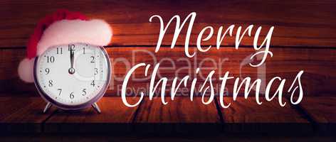 Composite image of christmas clock