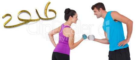 Composite image of fit man and woman lifting dumbbells