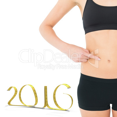 Composite image of closeup mid section of a fit woman with hands