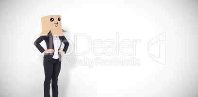 Composite image of businesswoman with box over head